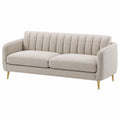 Divano a tre posti in tessuto beige con gambe in metallo